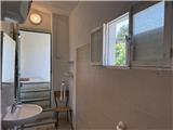 Ref. 012 – Spacious, sunny house with panoramic terrace, storage rooms and private land in front.
