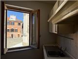 Ref. 018 – Sunny three-room flat in a traditional village house with stunning views over the valley and the sea.