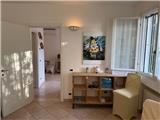 Ref. 001 – Three-room apartment with garden and private parking space.