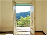 Ref. 044 - Sunny flat in need of renovation with panoramic view, box at street level and two cellars.