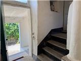 Ref. 012 – Spacious, sunny house with panoramic terrace, storage rooms and private land in front.