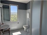 Ref. 018 – Sunny three-room flat in a traditional village house with stunning views over the valley and the sea.