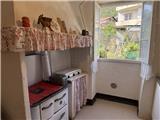 Ref. 012 – Spacious, sunny house with panoramic terrace, storage rooms and private land in front.