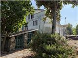 Ref. 012 – Spacious, sunny house with panoramic terrace, storage rooms and private land in front.