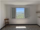 Ref. 018 – Sunny three-room flat in a traditional village house with stunning views over the valley and the sea.