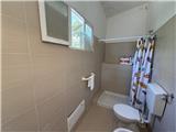 Ref. 012 – Spacious, sunny house with panoramic terrace, storage rooms and private land in front.