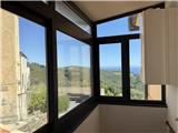 Ref. 018 – Sunny three-room flat in a traditional village house with stunning views over the valley and the sea.