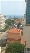 Rif. 069 &#8211; Ampio trilocale con vista mare