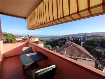 Ref. 027 – Sunny one-bedroom apartment with a splendid view over the village and the valley down to the sea.
